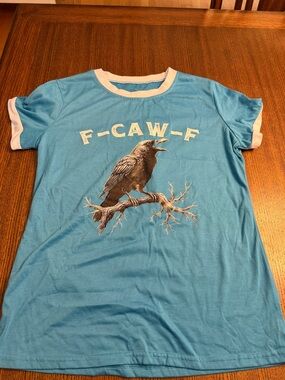Blue Ringer Tee with Raven Graphic